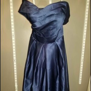 Navy blue satin ball gown, with corset back.